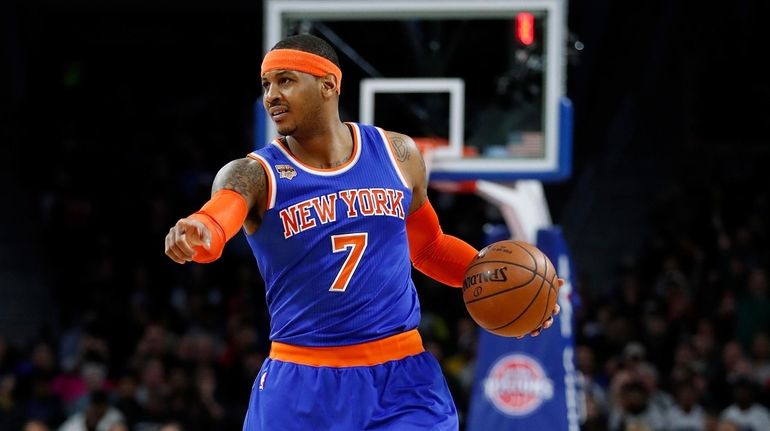 Carmelo Anthony #7 of the New York Knicks looks to...