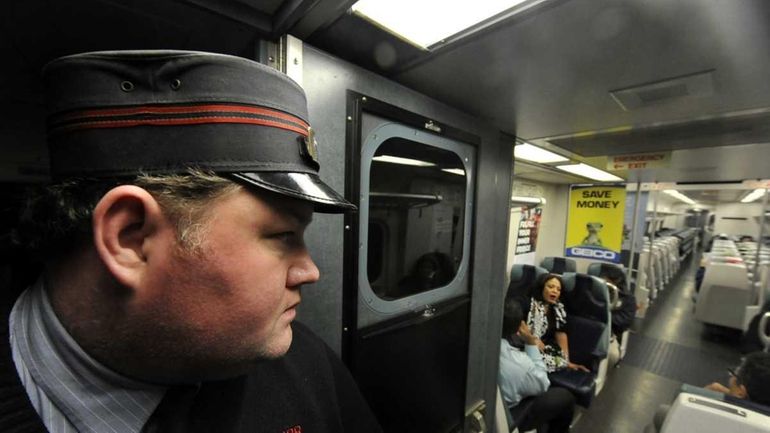 LIRR Conductor Tim Denehy annouces to passengers in the first...