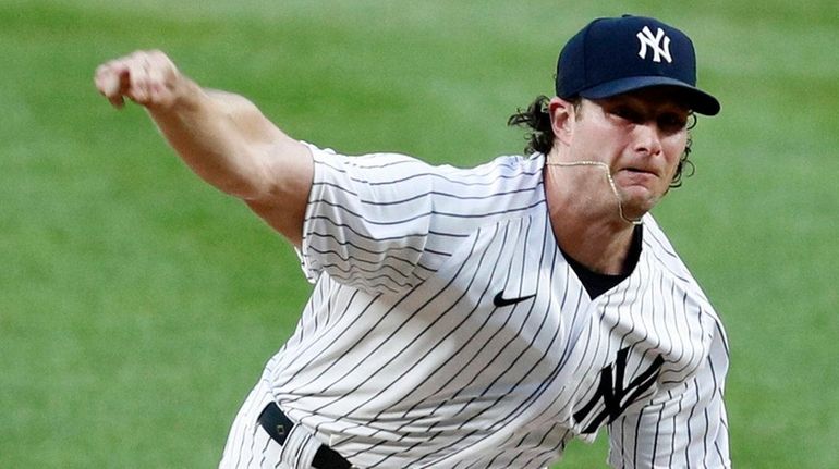 Gerrit Cole of the Yankees pitches during the second inning against...