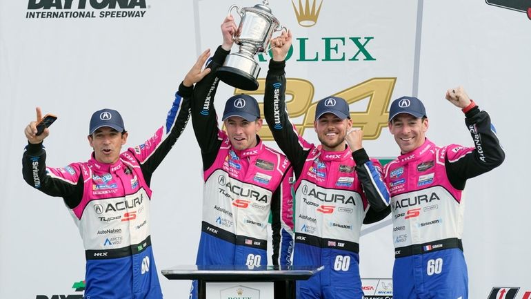 Meyer-Shank Racing team, from left, Helio Castroneves, of Brazil, Colin...