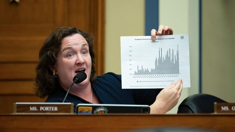 Rep. Katie Porter, D-Calif., asks questions during a hearing, Feb....