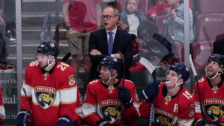 Florida Panthers' head coach Paul Maurice, top right, gestures to his  players during the second period of an NHL hockey game against the Chicago  Blackhawks, Friday, March 10, 2023, in Sunrise, Fla. (