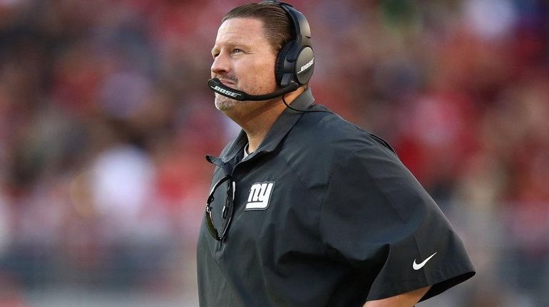 Ben McAdoo of the Giants looks on against the 49ers...