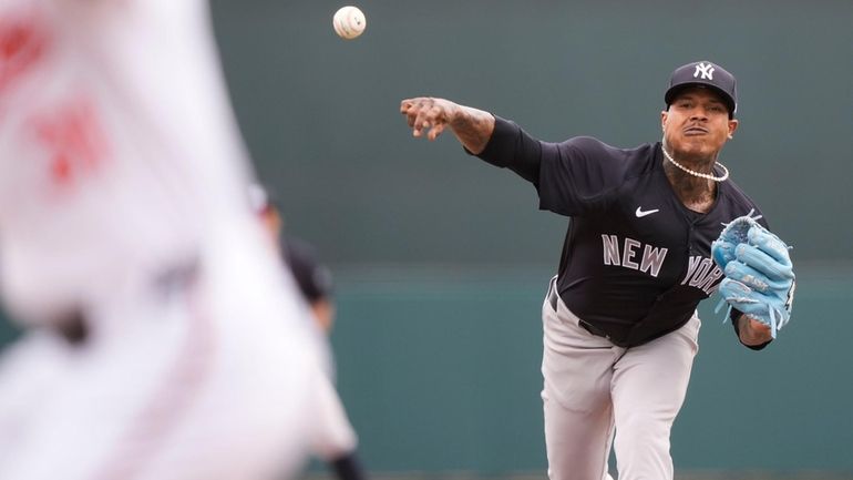 Yankees starting pitcher Marcus Stroman throws in the first inning...