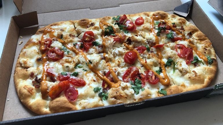 The chipotle chicken and bacon flatbread pizza, a new offering...