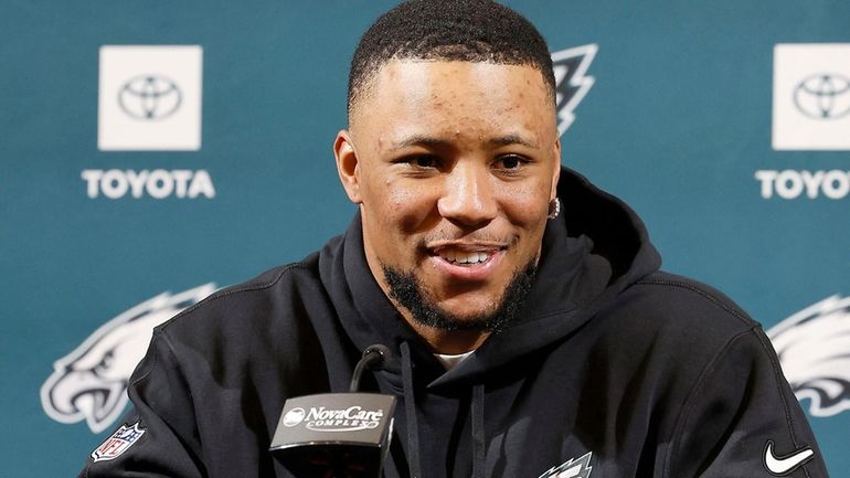 New Philadelphia Eagles running back Saquon Barkley speaks during an...