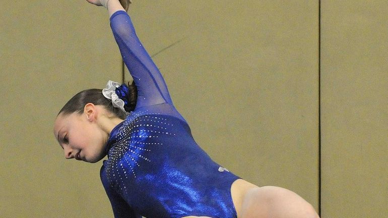 Miranda Lund of Plainview JFK performs her floor routine. (Jan....