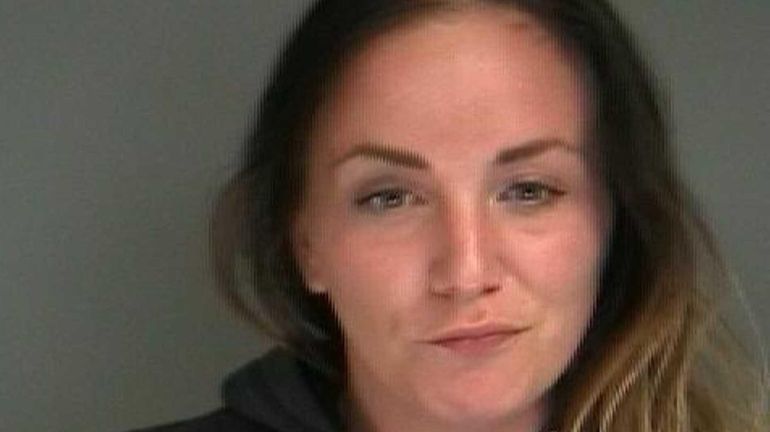 Suzanne Pesola, 26, of Coram, was arrested Monday, May 18,...