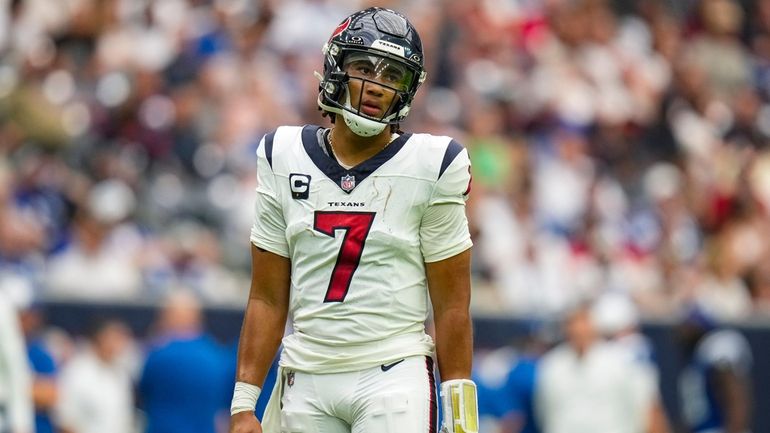 Houston Texans quarterback C.J. Stroud (7) looks to the sideline...