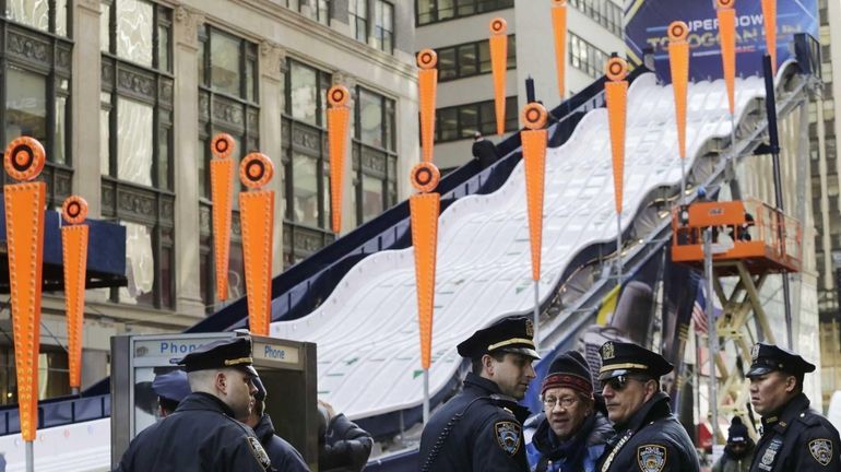 New York City police patrol next to a toboggan run...