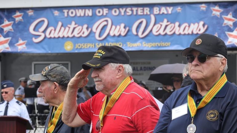 Vietnam veterans, from left, Gary Kahn, Joseph Grehan and Brian...