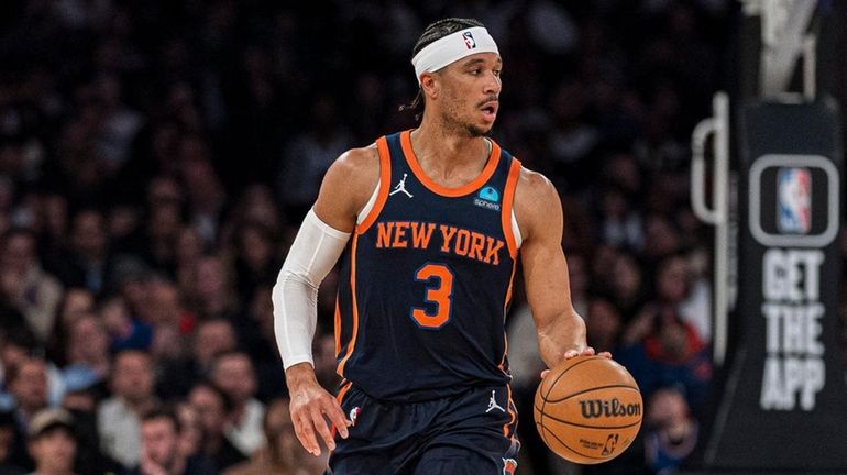 Knicks guard Josh Hart brings the ball up during the...