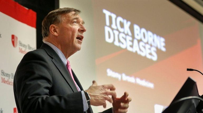 Stony Brook University president Dr. Samuel Stanley speaks at a...