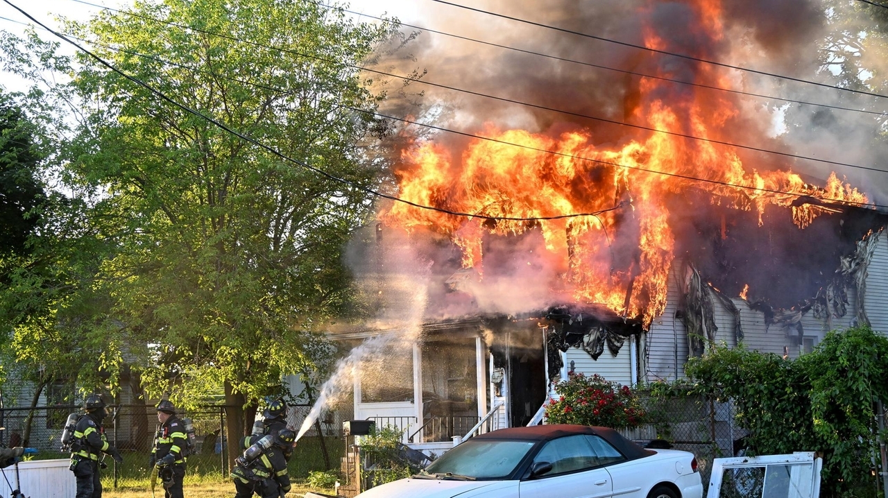 Firefighter burned in Bay Shore house fire that displaced 3 adults, officials say