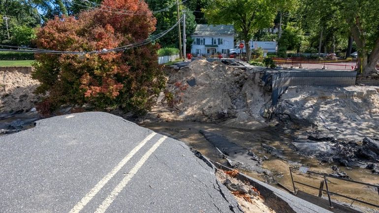 Harbor Road in Stony Brook, where an extreme rainfall last...