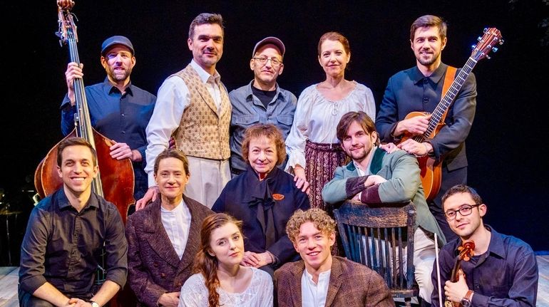 Director-playwright Will Pomerantz, standing center, songwriter Nancy Harrow, seated center,...