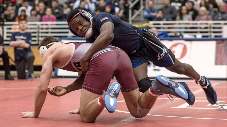 Long Beach's Jacori Teemer (right), wins his bout against North...