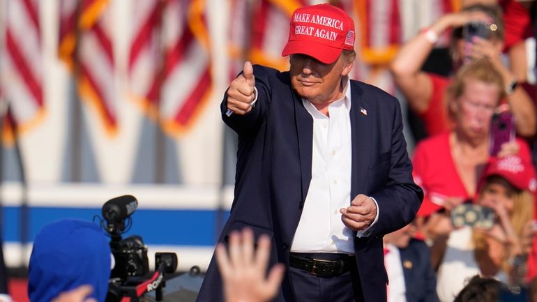 Republican presidential candidate former President Donald Trump speaks at a...