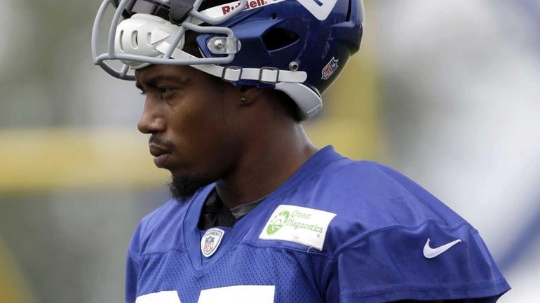 Giants defensive back Will Hill looks on during training camp....