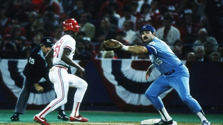 Steve Balboni of the Kansas City Royals catches a pick...