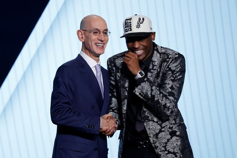 NBA commissioner Adam Silver and Bennedict Mathurin pose for photos News  Photo - Getty Images