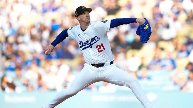 Los Angeles Dodgers starting pitcher Walker Buehler shows during the...