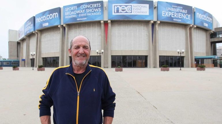 Donald Every, head usher at the Nassau Coliseum, poses for...