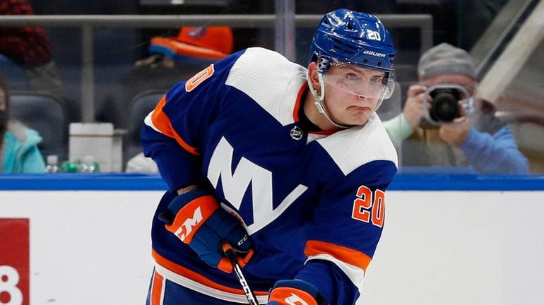 Kieffer Bellows of the Islanders shoots the puck during the third...