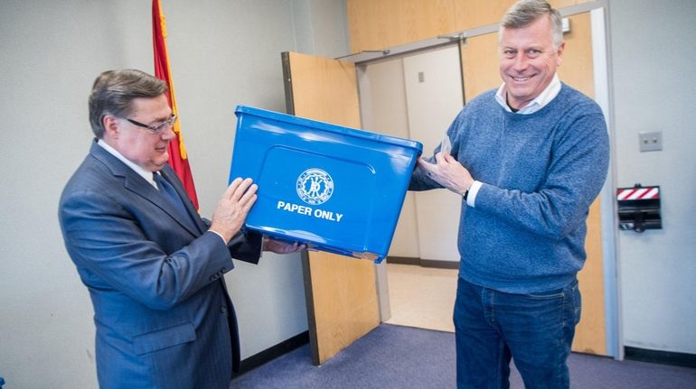 Brookhaven Town Supervisor Edward P. Romaine and Scott Convery, of Holtsville, show off...