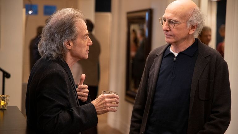 This image released by HBO shows Richard Lewis, left, with...