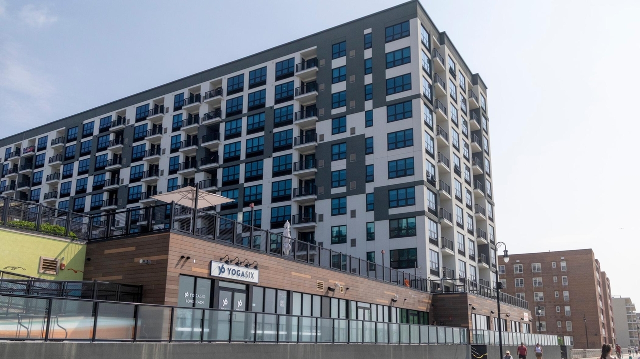 Former Long Beach Superblock is now homes, shops that are nearly fully occupied after decades-long building stall