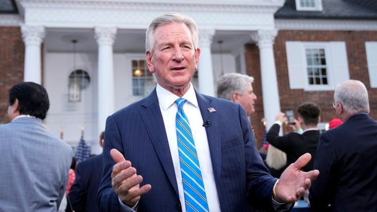 Sen. Tommy Tuberville, R-Ala., talks during a television interview before...