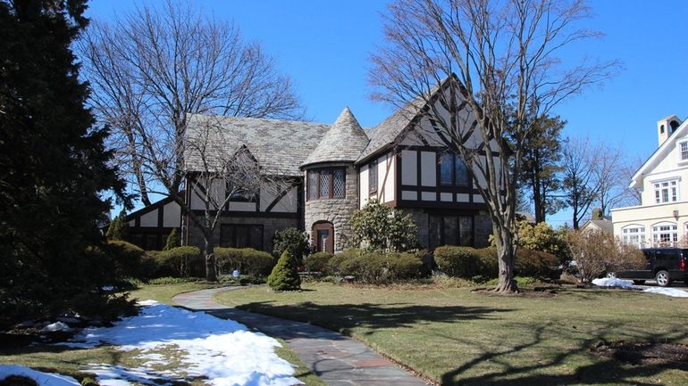 This quintessential Olive Tjaden-designed house from 1928 is located at 76...