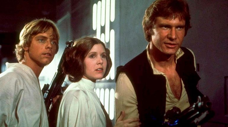 From left: Mark Hamill, Carrie Fisher and Harrison Ford starred...