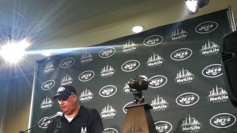 Rex Ryan with the MetLife Bowl "Snoopy" Trophy