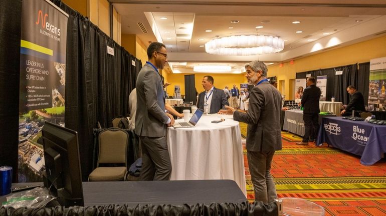 Networking during the trade show as Orsted/Eversource hold a supply...