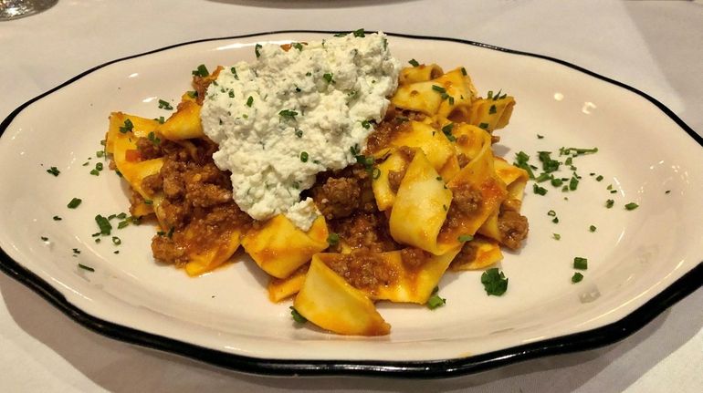 Pappardelle Bolognese is topped with herbed ricotta at Branzinos Bar...