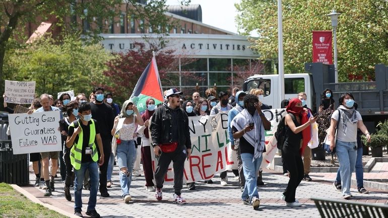 Protesters march on campus at Stony Brook University earlier this...