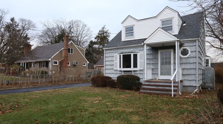 A house for sale in Huntington Station on Thursday. Home prices...