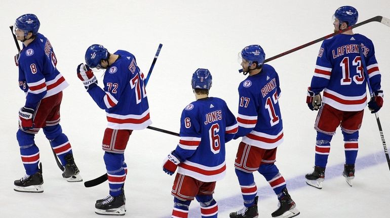 Rangers center Filip Chytil reacts after his miss clinched the win...