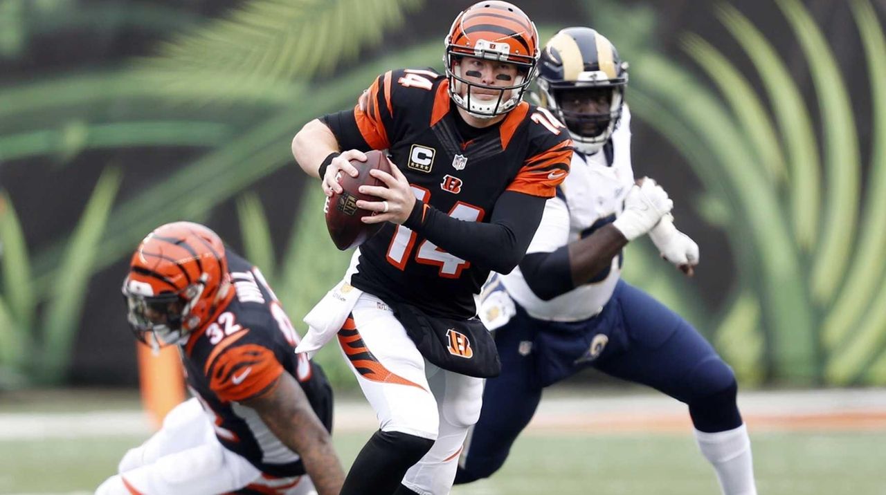 Burrow shakes off calf injury, throws for a season-high 259 yards as Bengals  beat the Rams 19-16 - Newsday