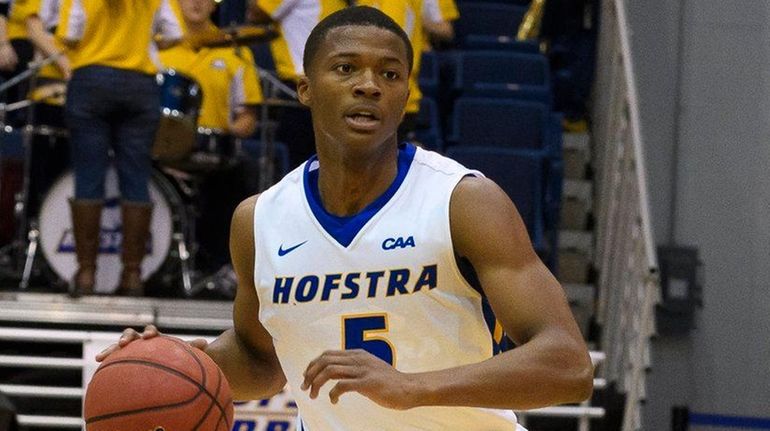 Hofstra guard Eli Pemberton heads upcourt on Kennesaw State guard...