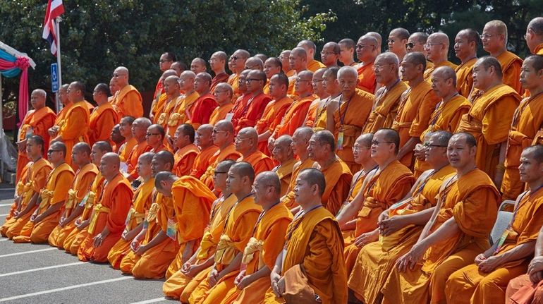 Monks sit for a photo at the Vajiradhammapadip Temple in...