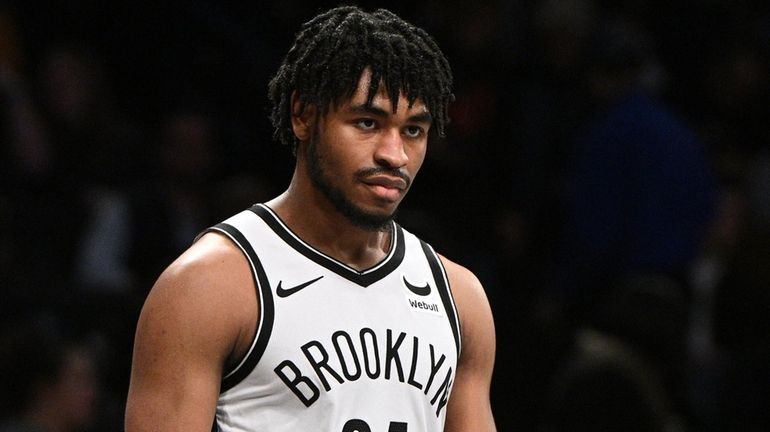 Nets guard Cam Thomas looks on against the LA Clippers...