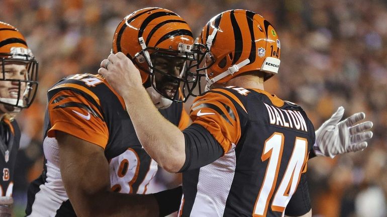 Cincinnati Bengals tight end Jermaine Gresham (84) is congratulated by...