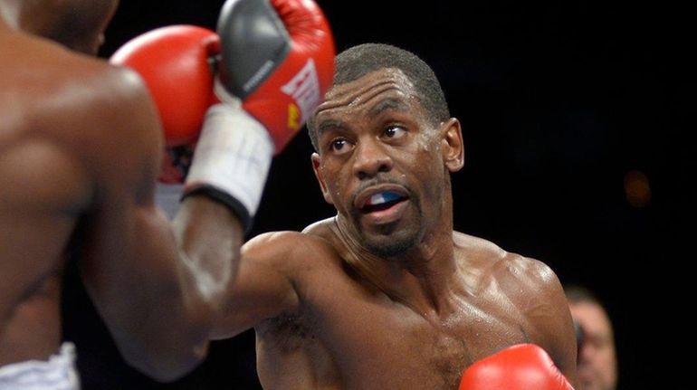 Jamel Herring takes a swing at Yakubu Amidu during a...