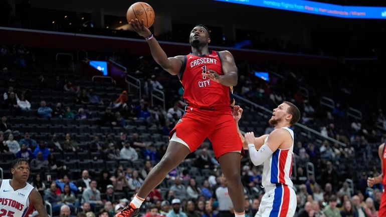 New Orleans Pelicans forward Zion Williamson (1) drives on Detroit...