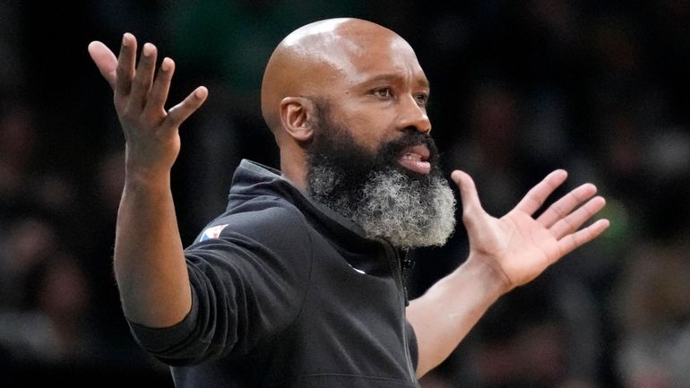 Nets head coach Jacque Vaughn gestures towards his players during...