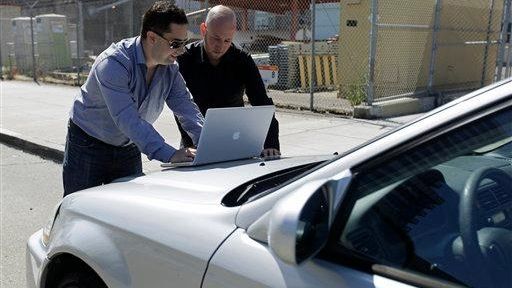 Security consultants Don Bailey, left, and Mathew Solnik of iSEC...