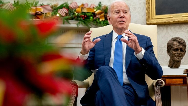 President Joe Biden meets with Angola's President Joao Manuel Goncalves...